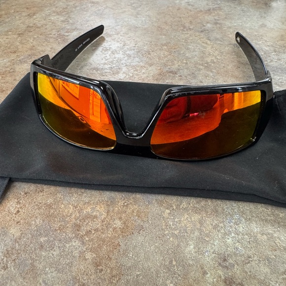 Oakley Other - Oakley Wrap Sunglasses with Black Frame and Red-Orange Mirrored Lenses